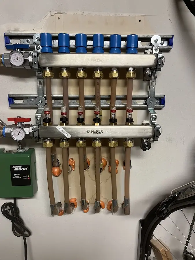 Plumber performing Gas Leak Detection at a residential property in South Kingstown